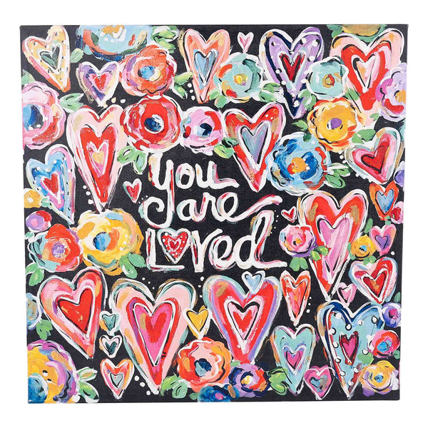 Colorful heart and flower pattern with 'You are loved' text on a black background