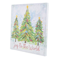 Decorative wall art with Christmas trees and 'Joy to the World' text on a light blue background.