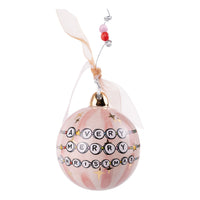 A Christmas ornament designed like a multicolored friendship bracelet with the text 'A Very Merry Christmas' displayed on it.