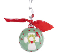 Decorative Christmas ornament with a red ribbon on a white background