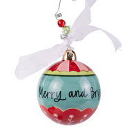 Colorful Christmas ornament with 'Merry and Bright' text on a white background