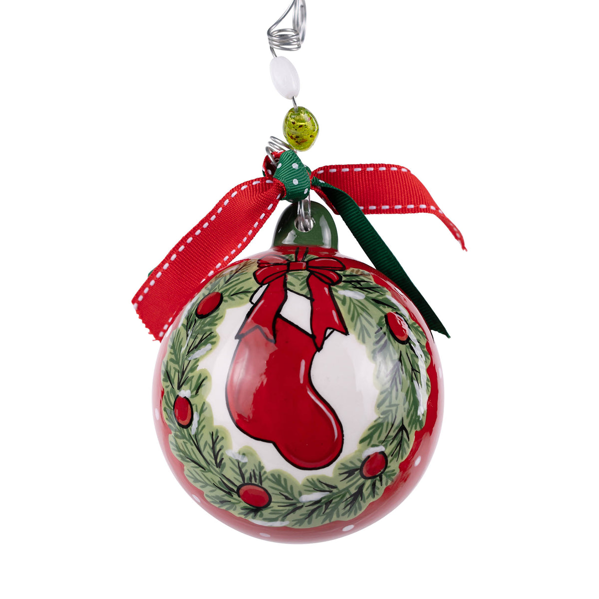 Christmas ornament with red stocking and green wreath design on a white background
