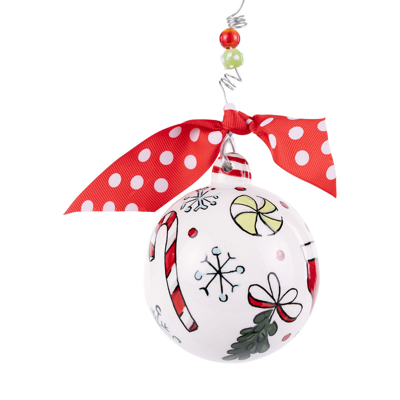 Christmas ornament with candy cane, bow, and snowflake designs on a white background.