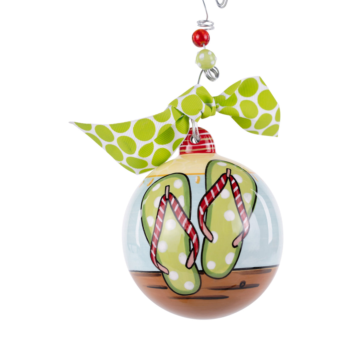 Decorative ornament with flip-flops and a polka dot ribbon on a white background