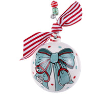 Decorative Christmas ornament with a blue bow design on a white background