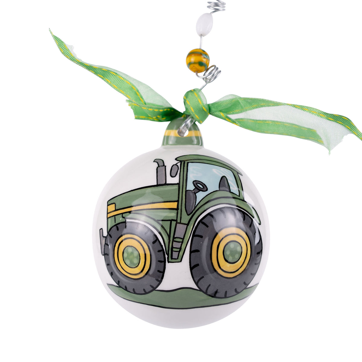 Round ornament with a green tractor design on a white background