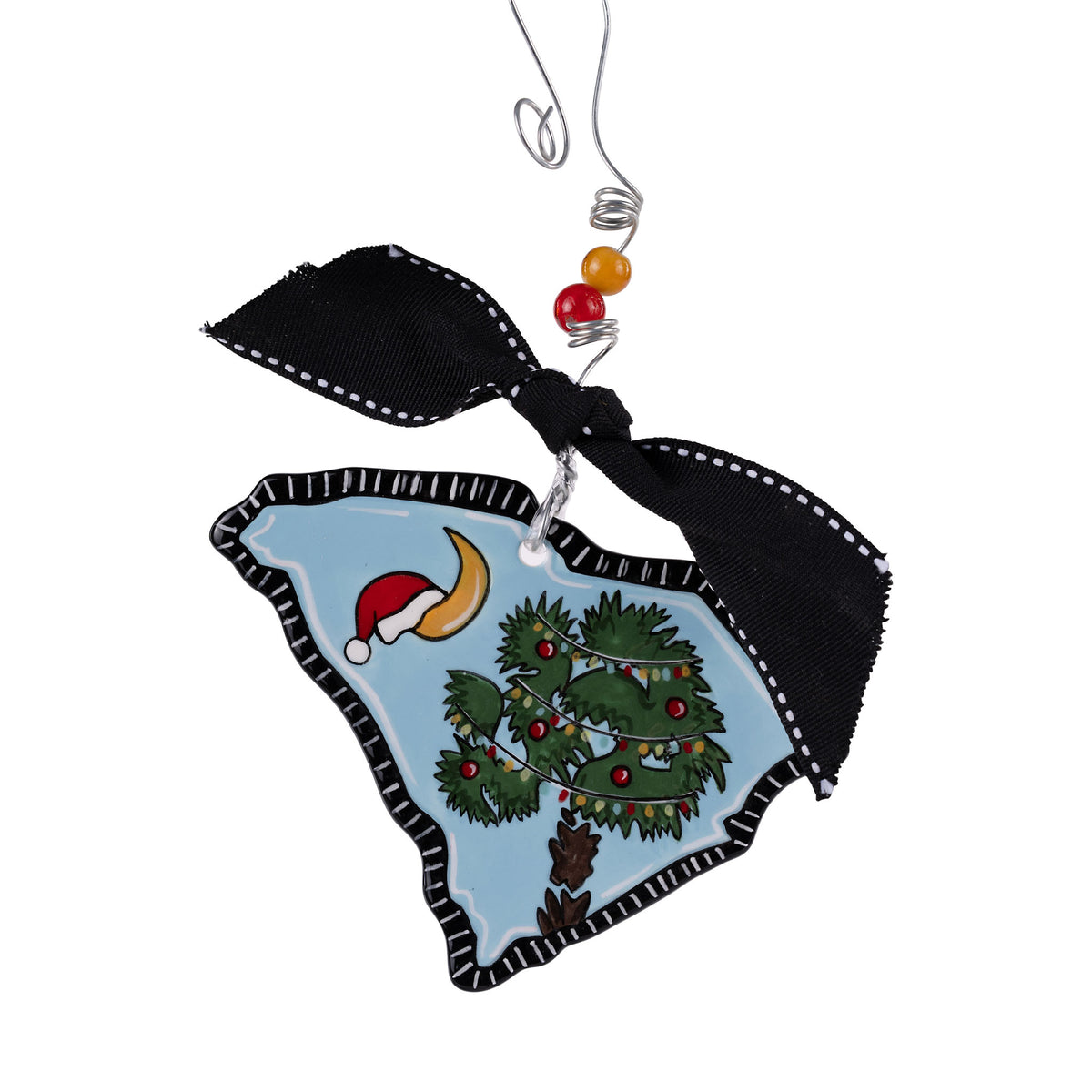 Decorative Christmas ornament shaped like South Carolina with festive design on a white background