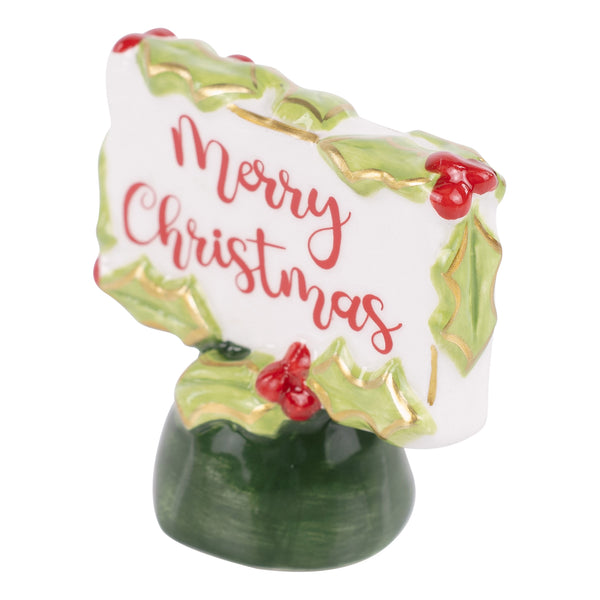 Decorative figurine with 'Merry Christmas' text on a white background