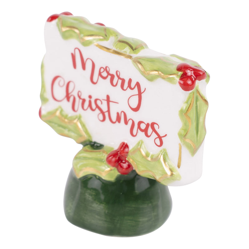 Decorative figurine with 'Merry Christmas' text on a white background