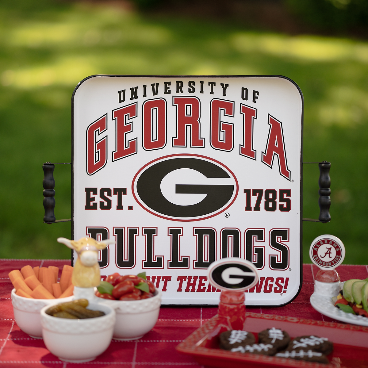 University of Georgia Bulldogs sign on a table with snacks and drinks.
