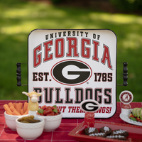University of Georgia Bulldogs sign on a table with snacks and drinks.