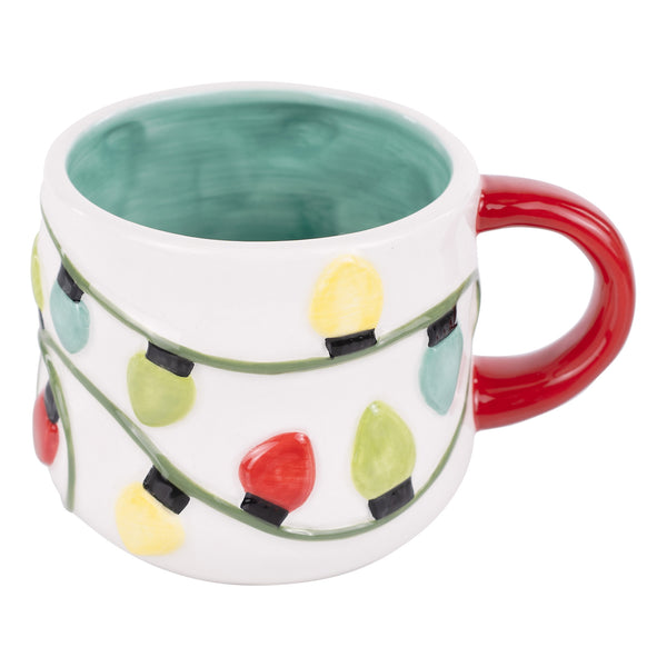 Decorative mug with colorful Christmas light design on a white background