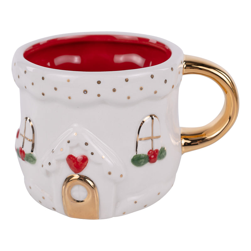 Decorative mug with a house design, gold handle, and red interior on a white background