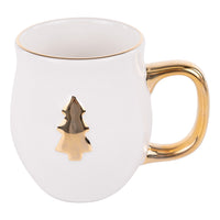 White mug with gold handle and decorative element on a white background