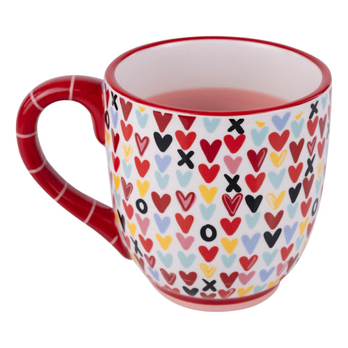 Mug with heart and cross pattern on a white background