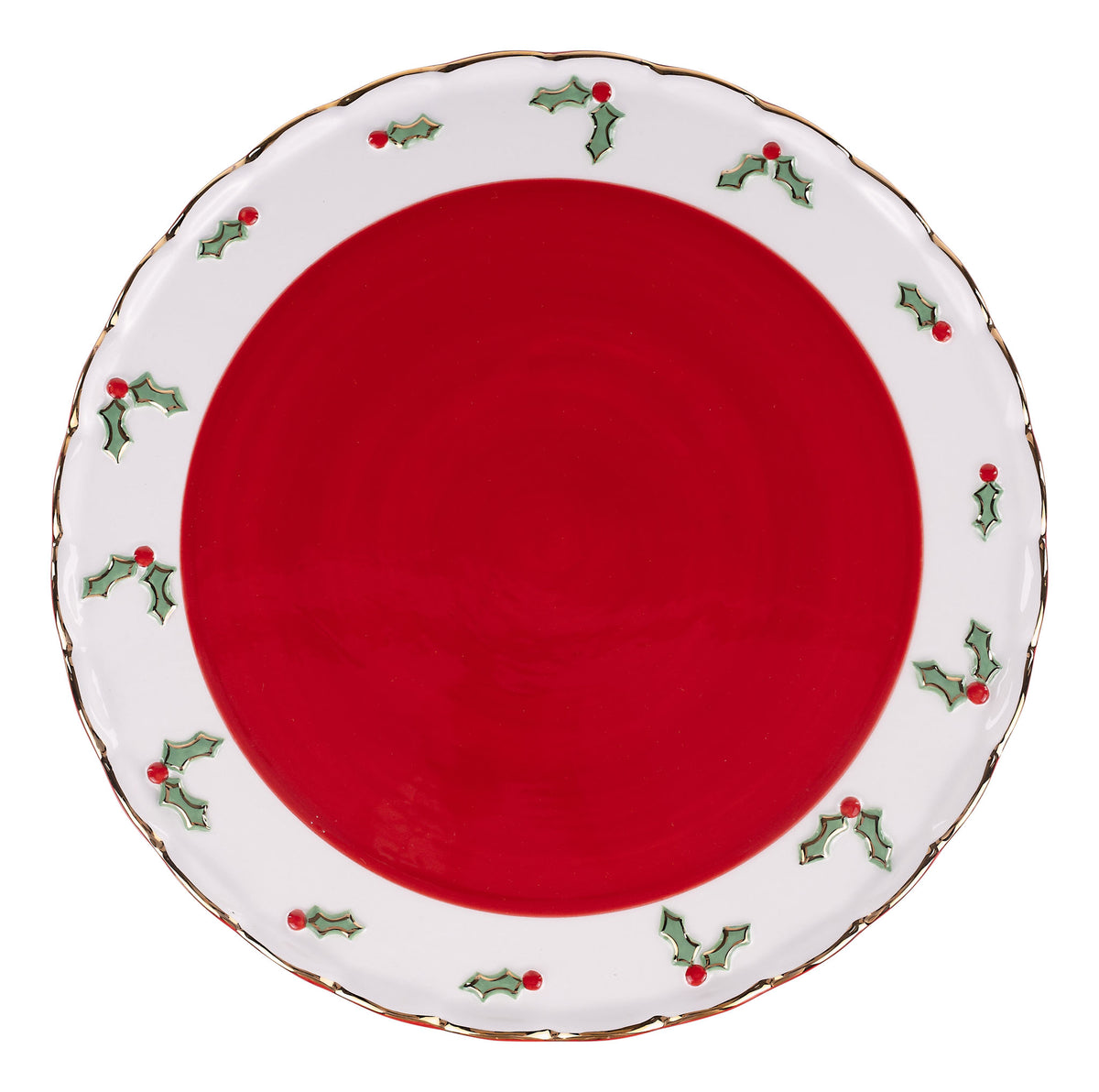 Red cake stand with decorative white rim featuring holly designs on a white background