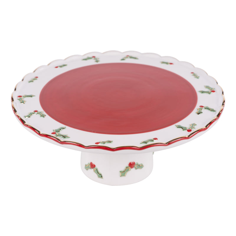 Decorative cake stand with red center and white border on a white background