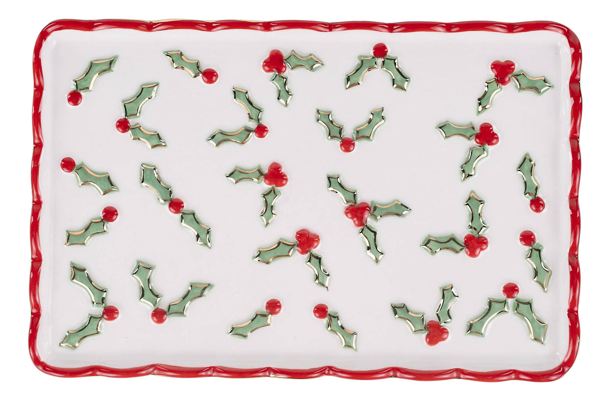 Rectangular white plate with holly berry pattern on a white background