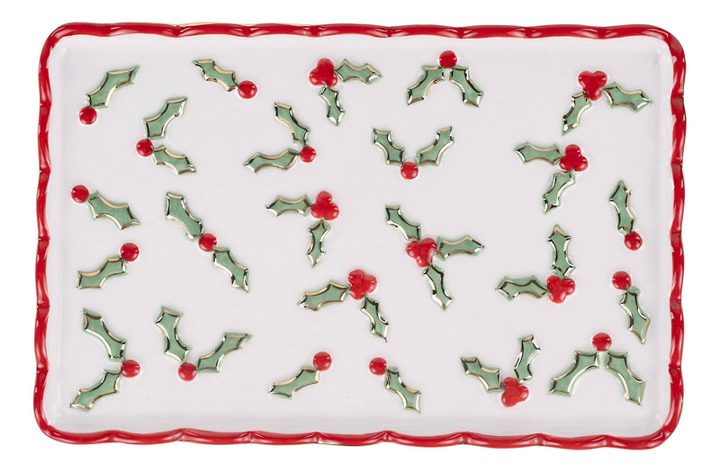 Rectangular white plate with holly berry pattern on a white background