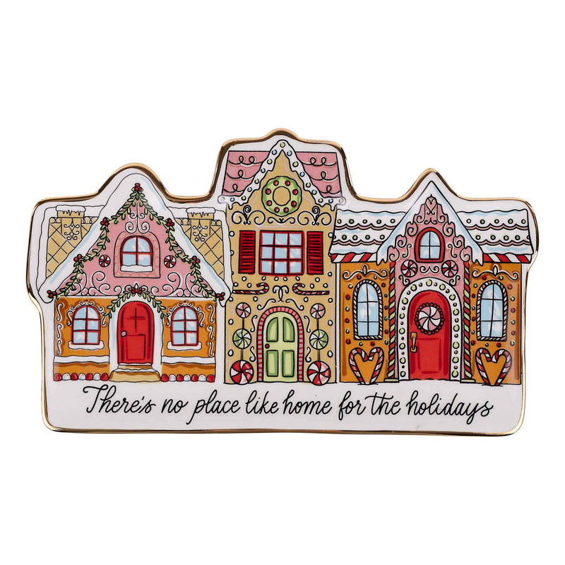 Decorative christmas house-shaped plate with colorful design on a white background