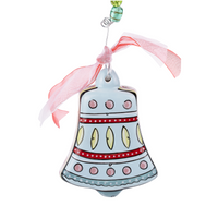 Decorative bell ornament with pink ribbon on a white background