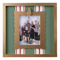 Decorative photo frame with a family photo inside, featuring a green background and red and white striped border.