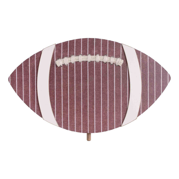 Decorative football-shaped item with striped pattern on a white background