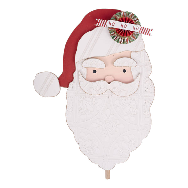 Decorative Santa head with red hat and white beard on a white background