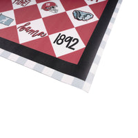 Patterned University of Alabama table runner with geometric designs on a white background