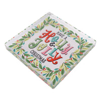 Napkin weight with 'Have a Holly Jolly Christmas' text and festive design on a white background