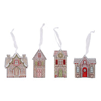 Four decorative house ornaments with colorful designs on a white background
