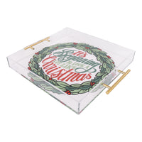 Clear glass tray with gold handles featuring a Christmas wreath design and text.