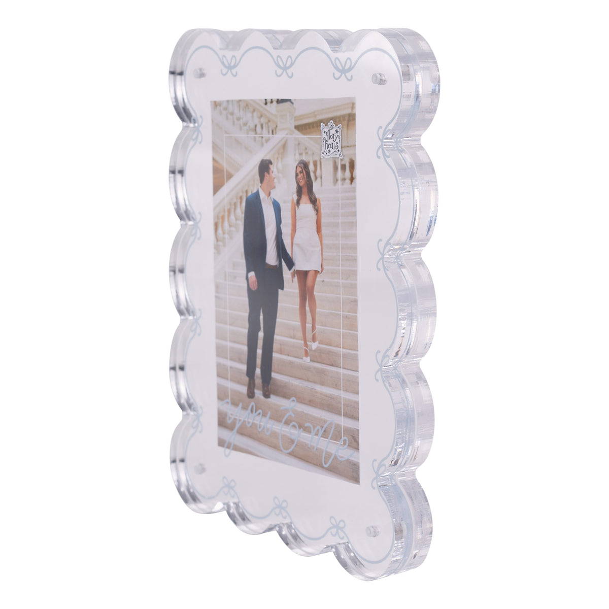 Clear acrylic photo frame with a couple on a staircase