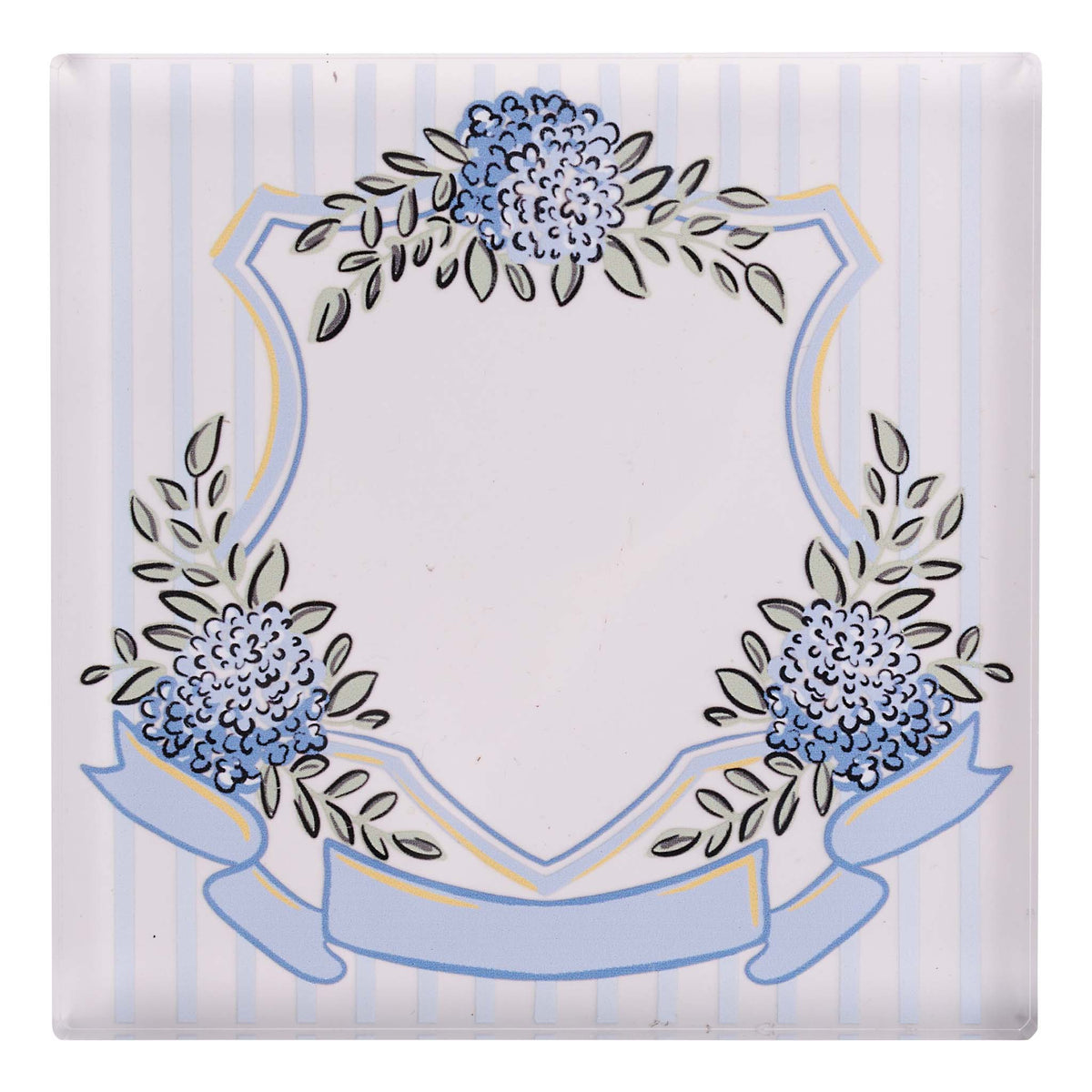 Decorative napkin weight with floral design on a striped background