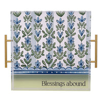 Decorative tray with floral pattern and 'Blessings abound' text on a white background