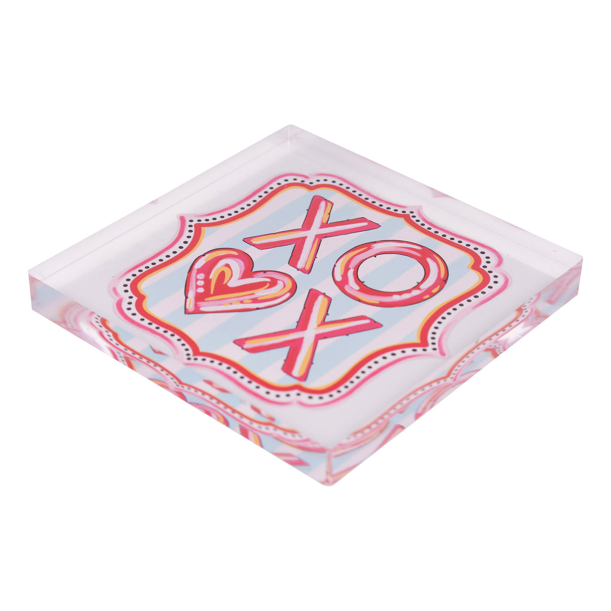 Decorative square napkin weight with 'XO' and heart design on a light blue background