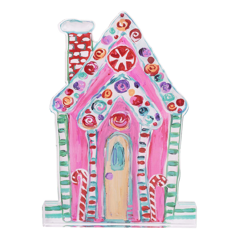 Colorful gingerbread house-shaped acrylic stand on a white background