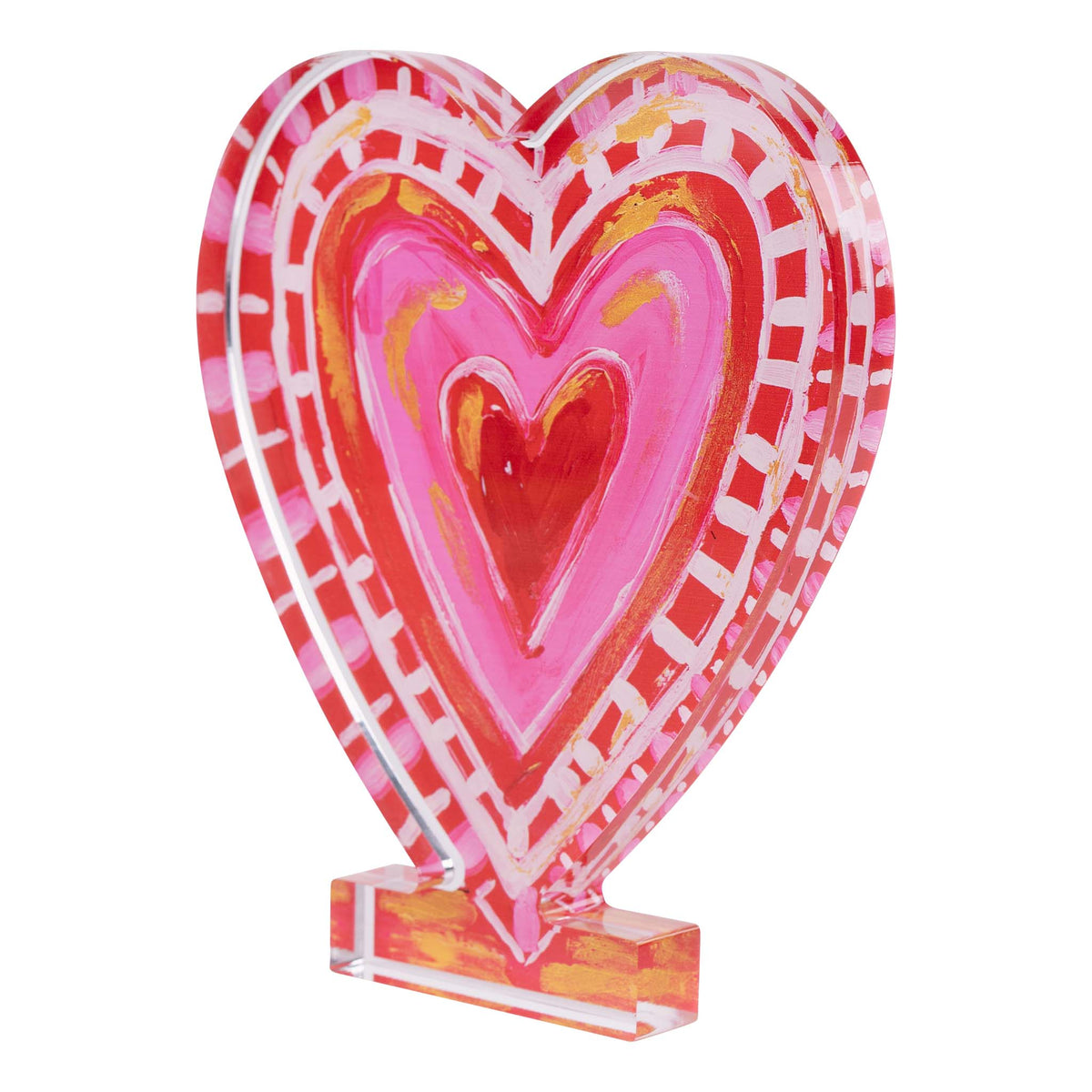 Colorful heart-shaped object with a clear base on a white background