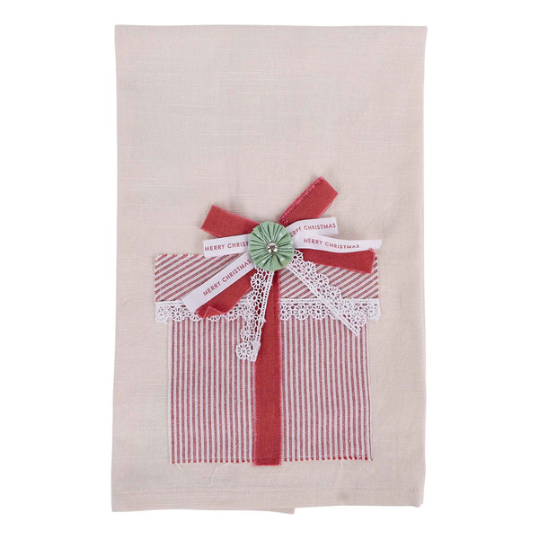Decorative towel with a red and white striped bow and 'Merry Christmas' tag on a beige background