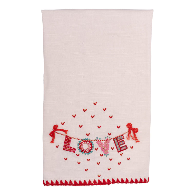 Decorative towel with 'LOVE' and heart designs on a white background