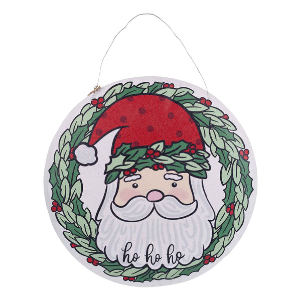 Decorative Christmas sign with a Santa Claus face surrounded by a wreath and red hat on a white background.