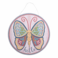 Decorative round sign with a colorful butterfly design and 'hello' text on a white background